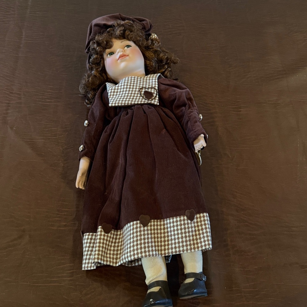 Vintage Style Porcelain Doll in Brown Dress